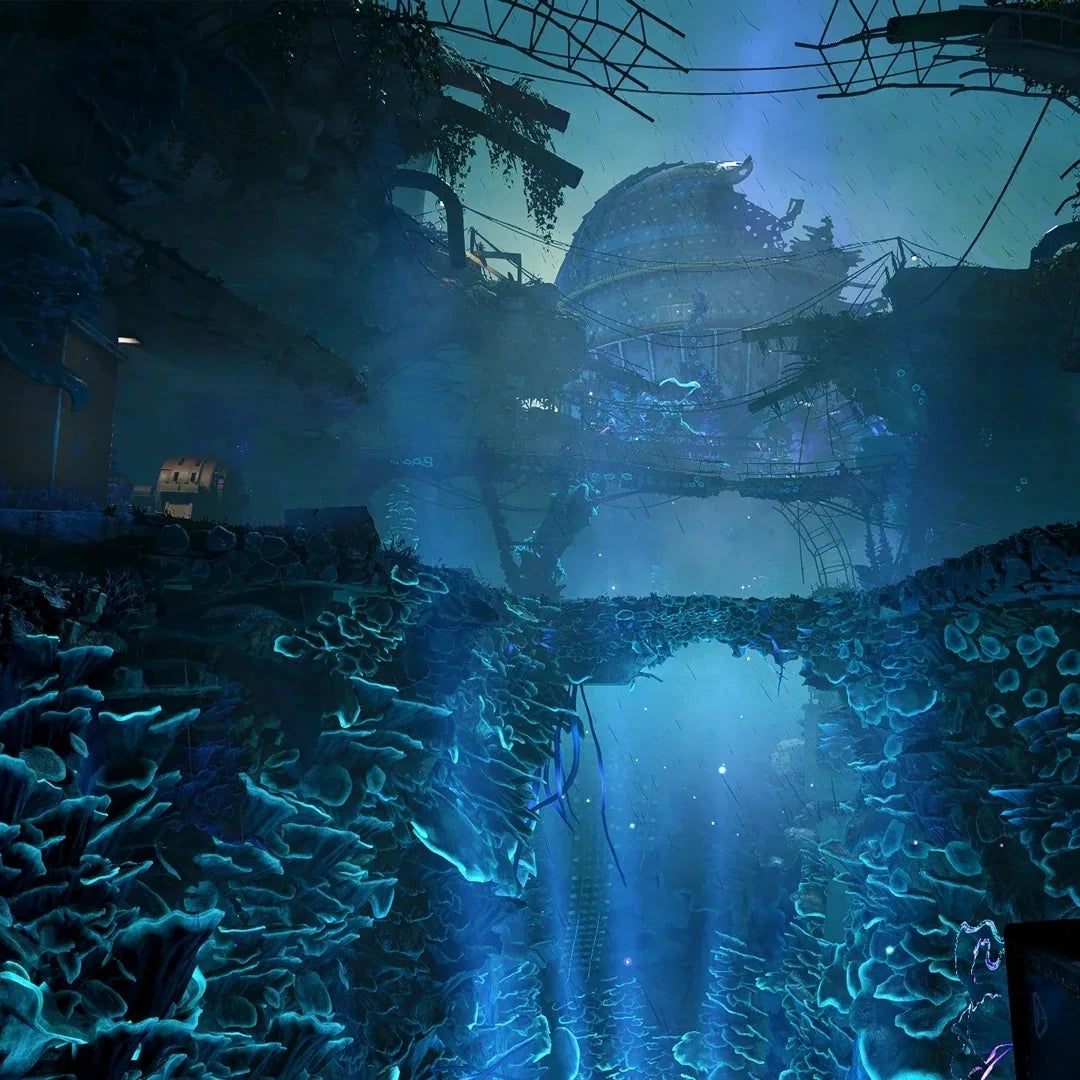 Underwater scene with coral and a large shipwreck in the background