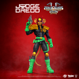 Judge Dredd action figure from Biker Mice Max series, posed holding a gun, wearing a black, green, and gold racing suit, set against a dark red background with brand logos.