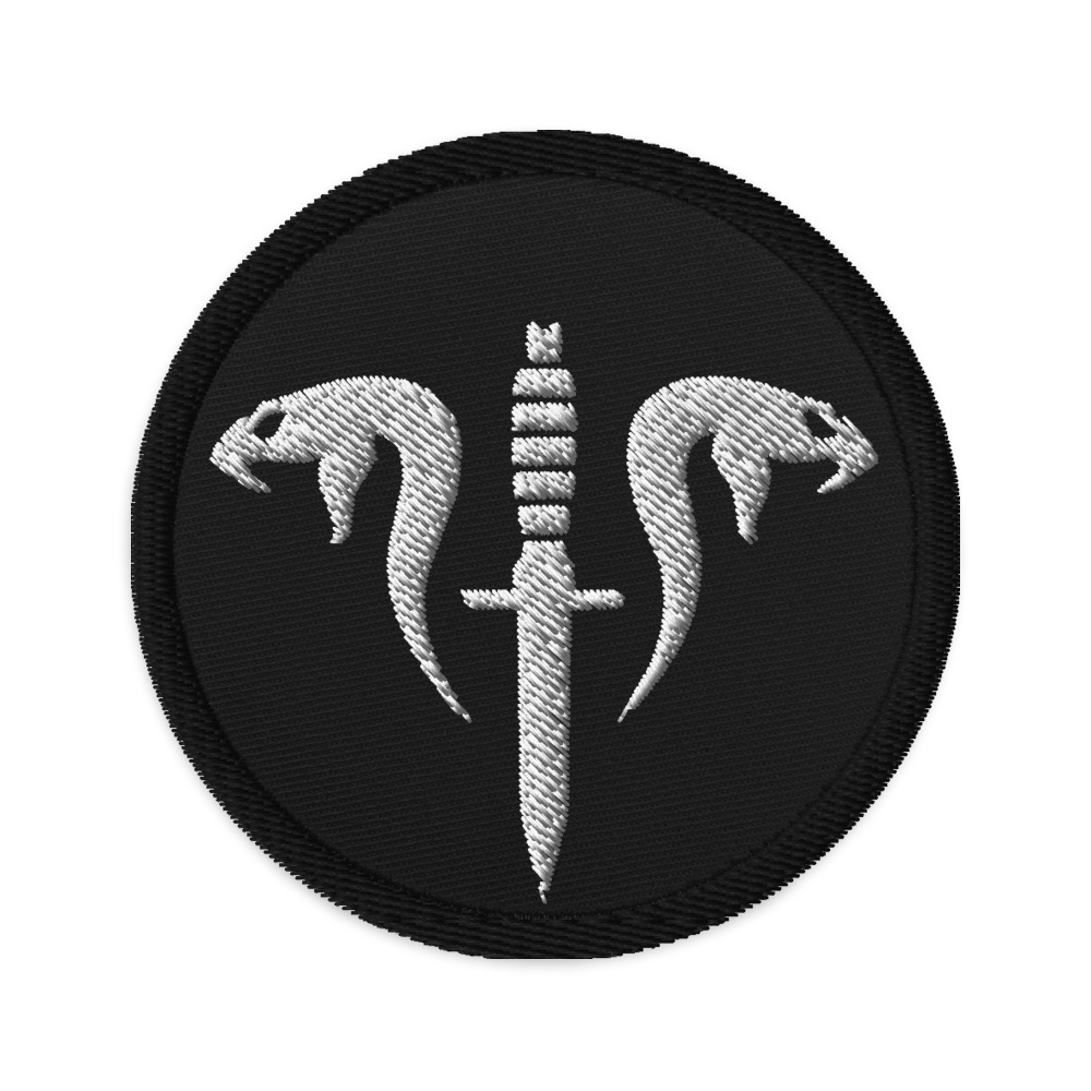 Image of a Black embroidered patch with white logo of snakes and dagger