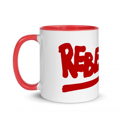 A white ceramic coffee mug with a red handle and Rebellion logo in red