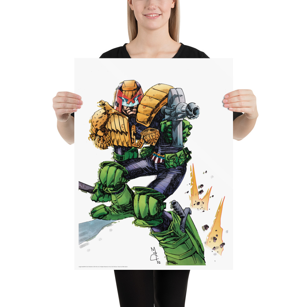 A3 poster showing JUDGE DREDD on a white background, under fire and with pistol up.
